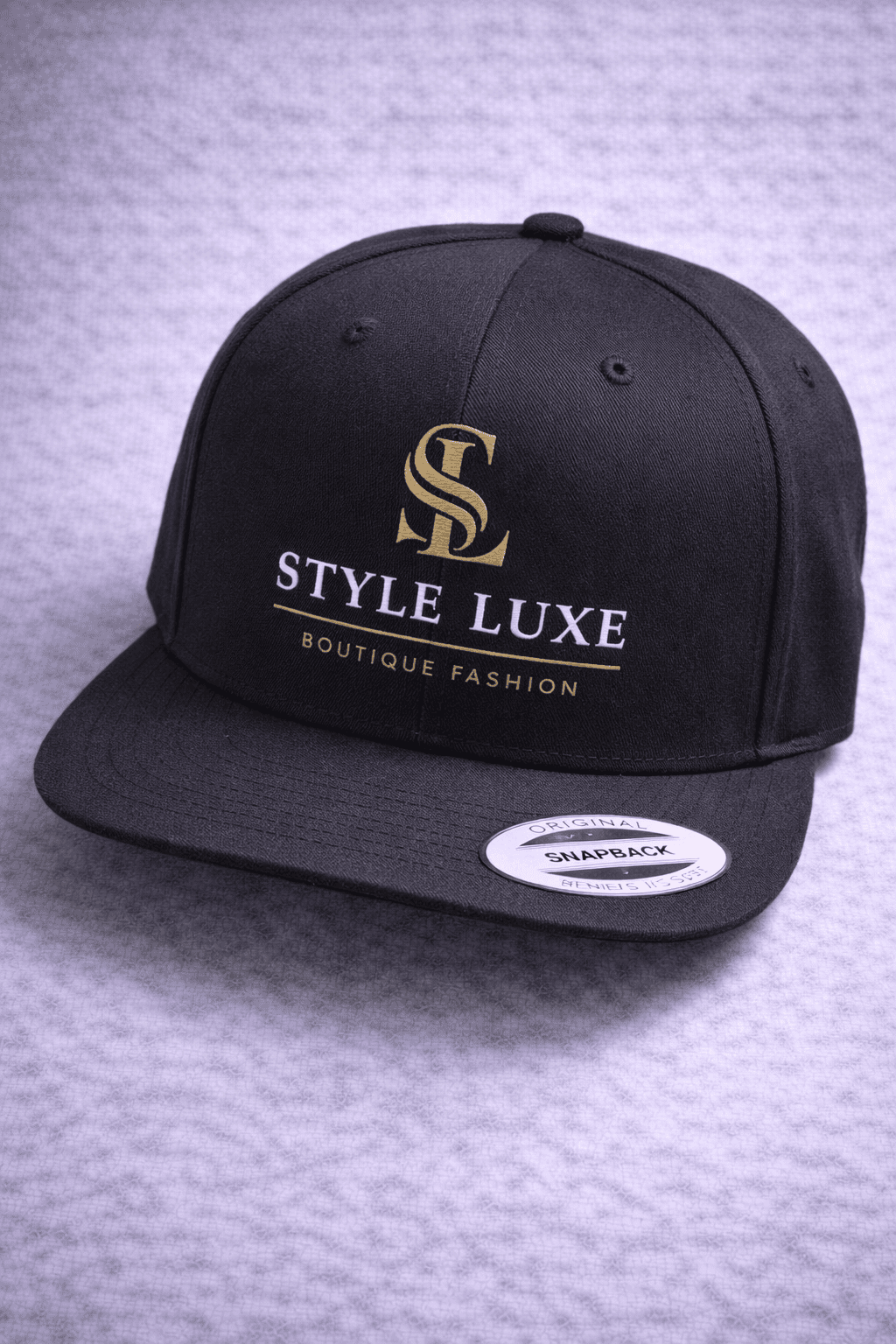 Flat-peak snapback cap with branded front panel