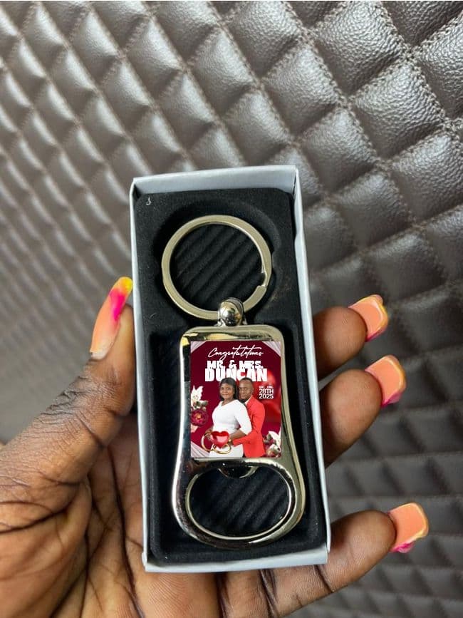 Metal keyring with a domed full-colour logo sticker